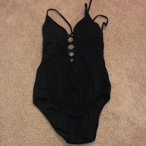Black strappy one piecr suit